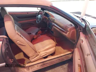 2001 Chrysler Sebring LXi z VIN 1C3EL55U61N638770, wystawiony jako IAAI lot #42228671 z przebiegiem 87 579 mil mil oraz . Historia ofert i sprzedaży dostępna na DreamBid. Obrazek 5.