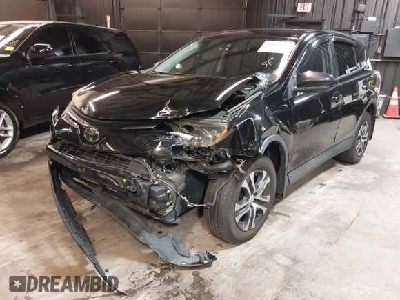 2018 Toyota RAV4 LE with VIN 2T3BFREV7JW768376, listed as a IAAI auction lot 41864571 with 292,147 mi miles. Bid and sale history available at carsss.com. Image 19.