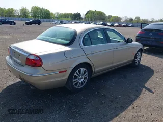 2005 Jaguar S-Type with VIN SAJWA01T95FN22745, listed as a IAAI auction lot 41898269 with 57,614 mi miles and . Bid and sale history available at DreamBid. Image 4.