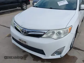 2014 Toyota Camry SE with VIN 4T1BK1FK5EU551196, listed as a IAAI auction lot 41912297 with 104,445 mi miles. Bid and sale history available at carsss.com. Image 6.
