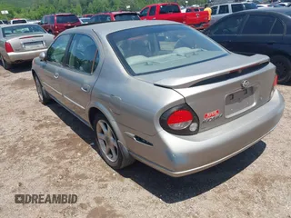 2000 Nissan Maxima GXE z VIN JN1CA31D0YT531421, wystawiony jako IAAI lot #42197398 z przebiegiem Nie podano mil oraz . Historia ofert i sprzedaży dostępna na DreamBid. Obrazek 3.