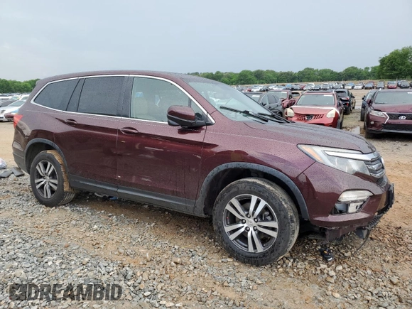 2017 Honda Pilot EX-L with VIN 5FNYF6H5XHB079081, listed as a Copart auction lot 54656305 with 197,010 mi miles and Salvage title. Bid and sale history available at DreamBid. Image 4.