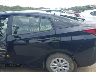 2020 Toyota Prius L Eco z VIN JTDKARFU6L3119565, wystawiony jako IAAI lot #41990990 z przebiegiem Nie podano mil oraz . Historia ofert i sprzedaży dostępna na DreamBid. Obrazek 6.