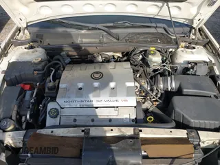 2002 Cadillac DeVille z VIN 1G6KD54Y72U218221, wystawiony jako IAAI lot #41842554 z przebiegiem 117 430 mil mil oraz . Historia ofert i sprzedaży dostępna na DreamBid. Obrazek 10.