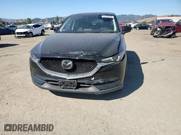 2018 Mazda CX-5 Grand Touring с VIN JM3KFADM2J1310339, выставлен на аукционе Copart как лот 64705245 с пробегом 63 927 миль миль и Списание • Salvage title. История ставок и продаж доступна на DreamBid. Изображение 15.