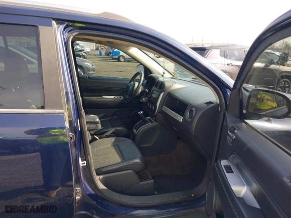 2014 Jeep Compass Latitude with VIN 1C4NJDEB1ED661864, listed as a IAAI auction lot 41950564 with 106,833 mi miles. Bid and sale history available at carsss.com. Image 5.