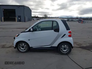 2013 Smart fortwo Pure with VIN WMEEJ3BA2DK702004, listed as a IAAI auction lot 41829808 with 53,545 mi miles and . Bid and sale history available at DreamBid. Image 15.
