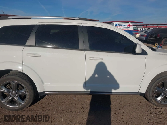 2017 Dodge Journey Crossroad Plus z VIN 3C4PDCGG4HT575546, wystawiony jako IAAI lot #41477700 z przebiegiem 176 968 mil mil oraz . Historia ofert i sprzedaży dostępna na DreamBid. Obrazek 13.