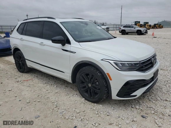 2022 Volkswagen Tiguan SE R-Line Black with VIN 3VVCB7AX0NM169257, listed as a Copart auction lot 43129745 with 59,517 mi miles and Salvage Title. Bid and sale history available at carsss.com. Image 4.