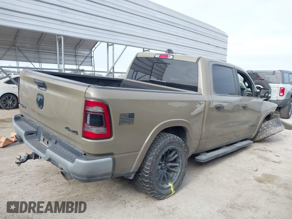 2020 Ram 1500 Big Horn with VIN 1C6SRFFT0LN301093, listed as a IAAI auction lot 41607746 with 65,223 mi miles and . Bid and sale history available at DreamBid. Image 4.