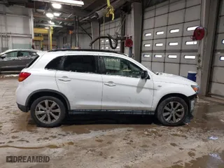 2013 Mitsubishi Outlander Sport LE with VIN 4A4AP5AU1DE024002, listed as a IAAI auction lot 41139737 with 152,609 mi miles. Bid and sale history available at carsss.com. Image 14.
