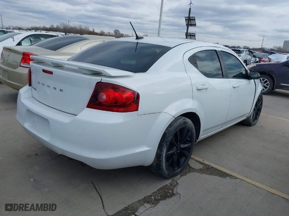 2014 Dodge Avenger SE with VIN 1C3CDZAB8EN200550, listed as a IAAI auction lot 40389714 with 74,029 mi miles. Bid and sale history available at carsss.com. Image 4.
