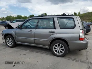 2006 Subaru Forester X with VIN JF1SG65656H709849, listed as a Copart auction lot 59811325 with 198,659 mi miles and Salvage title. Bid and sale history available at DreamBid. Image 2.