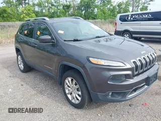 2014 Jeep Cherokee Limited z VIN 1C4PJMDSXEW294199, wystawiony jako IAAI lot #42466782 z przebiegiem 137 783 mil mil oraz . Historia ofert i sprzedaży dostępna na DreamBid. Obrazek 1.