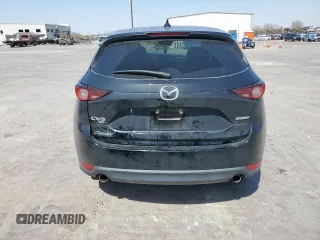 2021 Mazda CX-5 Touring with VIN JM3KFBCM3M0343447, listed as a Copart auction lot 49587305 with 99,633 mi miles and Salvage Title. Bid and sale history available at carsss.com. Image 6.