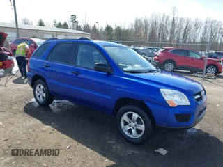 2009 Kia Sportage LX with VIN KNDJF724697629066, listed as a IAAI auction lot 41757196 with 61,595 mi miles. Bid and sale history available at carsss.com. Image 1.