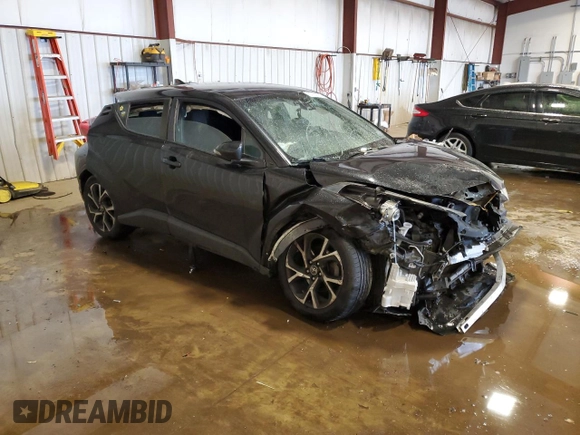 2018 Toyota C-HR XLE z VIN NMTKHMBX0JR041387, wystawiony jako Copart lot #57050385 z przebiegiem Nie podano mil oraz Szkody całkowita. Historia ofert i sprzedaży dostępna na DreamBid. Obrazek 4.