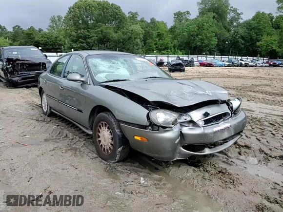 1999 Mercury Sable LS with VIN 1MEFM53U6XG646248, listed as a Copart auction lot 57859405 with 128,286 mi miles and Salvage title. Bid and sale history available at DreamBid. Image 13.