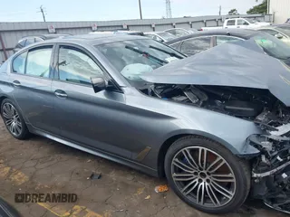2018 BMW 5 Series M550i xDrive with VIN WBAJB9C53JB286035, listed as a IAAI auction lot 40590380 with 57,072 mi miles and . Bid and sale history available at carsss.com. Image 13.