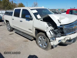 2015 Chevrolet Silverado 1500 High Country with VIN 3GCUKTEJ2FG434388, listed as a IAAI auction lot 41677014 with 117,959 mi miles and . Bid and sale history available at DreamBid. Image 1.
