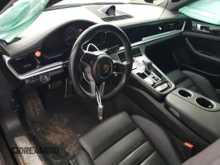 2018 Porsche Panamera 4 E-Hybrid z VIN WP0AE2A72JL127720, wystawiony jako Copart lot #71872404 z przebiegiem Nie podano mil oraz Szkoda całkowita • Salvage title. Historia ofert i sprzedaży dostępna na DreamBid. Obrazek 8.