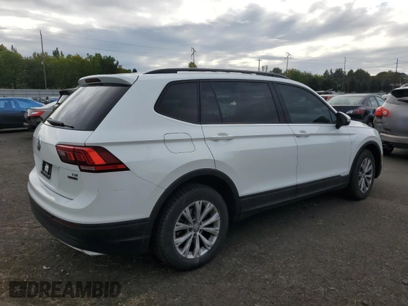 2018 Volkswagen Tiguan S with VIN 3VV0B7AX6JM111232, listed as a Copart auction lot 74944624 with 106,979 mi miles and Salvage Title. Bid and sale history available at DreamBid. Image 3.