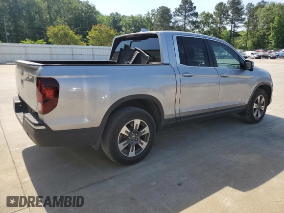 2019 Honda Ridgeline RTL-T with VIN 5FPYK3F67KB031672, listed as a Copart auction lot 55080205 with 106,912 mi miles and Salvage title. Bid and sale history available at DreamBid. Image 3.