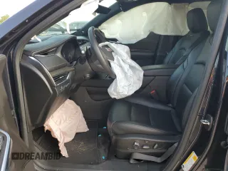 2022 Cadillac XT4 FWD Sport z VIN 1GYFZER45NF156035, wystawiony jako Copart lot #65836294 z przebiegiem 62 443 mil mil oraz Szkoda całkowita • Salvage title. Historia ofert i sprzedaży dostępna na DreamBid. Obrazek 7.