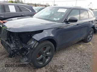 2025 Land Rover Range Rover Velar Dynamic SE with VIN SALYL2EX9SA809479, listed as a IAAI auction lot 42150495 with 7,038 mi miles and . Bid and sale history available at DreamBid. Image 14.