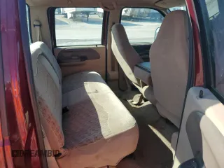 2000 Ford F-350 XL with VIN 1FTSW30F6YEB89796, listed as a Copart auction lot 67490144 with 517,242 mi miles and Salvage Title. Bid and sale history available at DreamBid. Image 11.