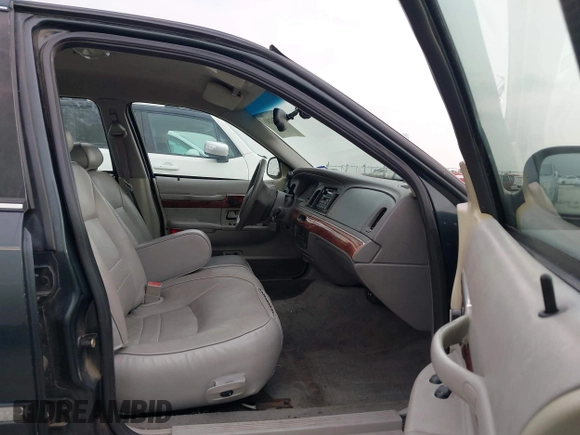 2002 Mercury Grand Marquis LS Premium z VIN 2MEFM75WX2X626520, wystawiony jako IAAI lot #42374203 z przebiegiem 139 692 mil mil oraz . Historia ofert i sprzedaży dostępna na DreamBid. Obrazek 5.