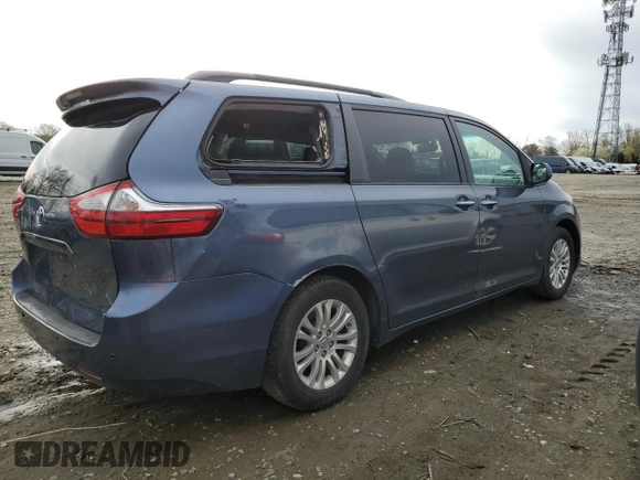 2015 Toyota Sienna XLE with VIN 5TDYK3DC4FS643475, listed as a Copart auction lot 52697405 with 153,808 mi miles and Salvage Title. Bid and sale history available at DreamBid. Image 3.