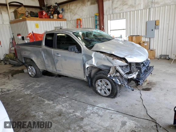 2015 Chevrolet Colorado 4WD WT with VIN 1GCHTAE36F1213461, listed as a Copart auction lot 54248414 with 100,052 mi miles and Salvage Title. Bid and sale history available at DreamBid. Image 4.