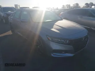 2019 Honda Accord Sport z VIN 1HGCV2F35KA005849, wystawiony jako IAAI lot #40894177 z przebiegiem 71 166 mil mil oraz . Historia ofert i sprzedaży dostępna na DreamBid. Obrazek 1.