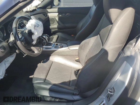 2011 BMW Z4 sDrive35is with VIN WBALM1C54BE633439, listed as a Copart auction lot 60327265 with 112,302 mi miles and Salvage title. Bid and sale history available at DreamBid. Image 7.