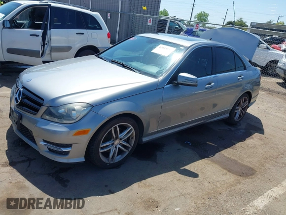 2014 Mercedes-Benz C 250 Sport with VIN WDDGF4HB9EA961665, listed as a IAAI auction lot 42055533 with 112,404 mi miles and . Bid and sale history available at DreamBid. Image 2.
