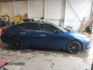 2016 Nissan Maxima SV z VIN 1N4AA6AP6GC449746, wystawiony jako IAAI lot #41971947 z przebiegiem 110 323 mil mil oraz . Historia ofert i sprzedaży dostępna na DreamBid. Obrazek 13.