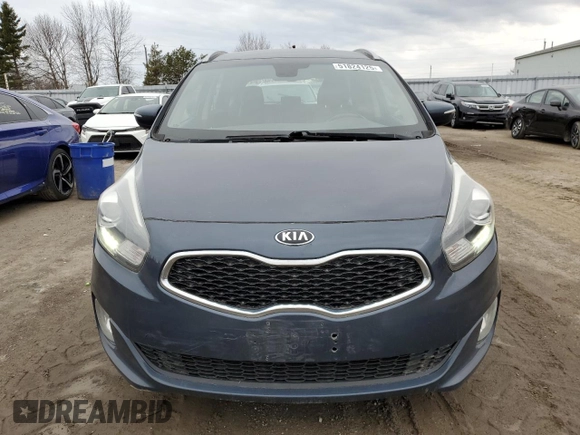 2014 Kia Rondo EX with VIN KNAHU8A39E7037977, listed as a Copart auction lot 51824125 with 292,042 mi miles and Clean Title. Bid and sale history available at carsss.com. Image 5.