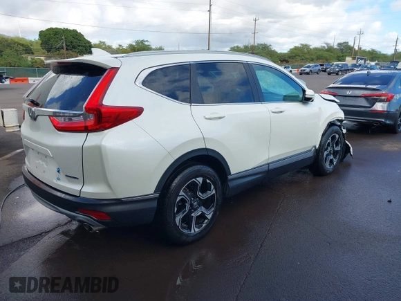 2018 Honda CR-V Touring with VIN 2HKRW1H96JH506435, listed as a IAAI auction lot 41228873 with 11,585 mi miles and . Bid and sale history available at DreamBid. Image 4.