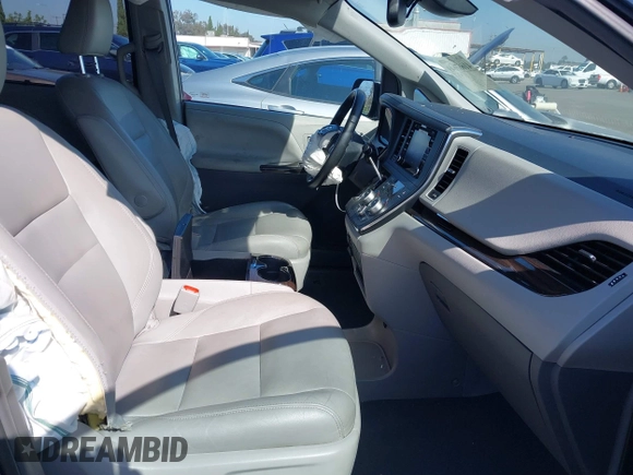 2019 Toyota Sienna XLE with VIN 5TDDZ3DC9KS220976, listed as a IAAI auction lot 41667049 with 92,568 mi miles and . Bid and sale history available at DreamBid. Image 5.