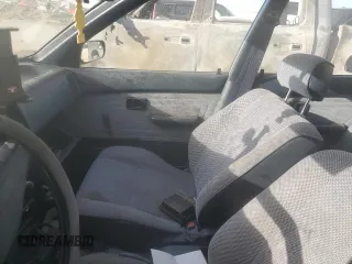 1988 Toyota Corolla z VIN JT2AE92E9J3140852, wystawiony jako Copart lot #74968874 z przebiegiem 169 427 mil mil oraz Szkoda całkowita • Salvage title. Historia ofert i sprzedaży dostępna na DreamBid. Obrazek 7.