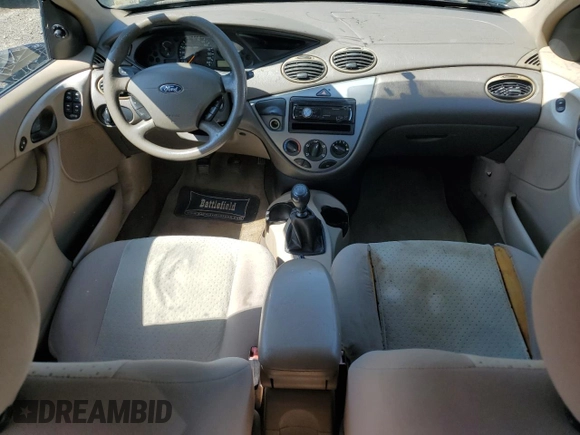 2004 Ford Focus ZTW with VIN 1FAFP35Z84W203676, listed as a Copart auction lot 57272835 with 183,115 mi miles and Salvage title. Bid and sale history available at DreamBid. Image 8.