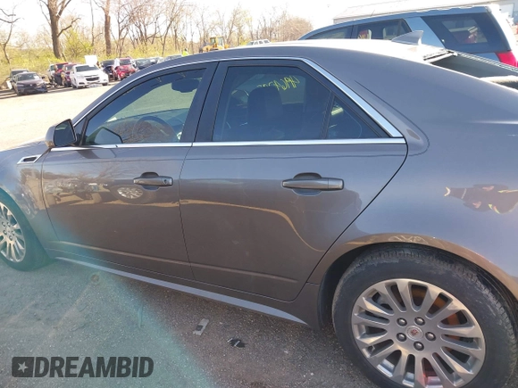 2012 Cadillac CTS Premium with VIN 1G6DS5E3XC0128264, listed as a IAAI auction lot 41964295 with 117,889 mi miles and . Bid and sale history available at DreamBid. Image 14.