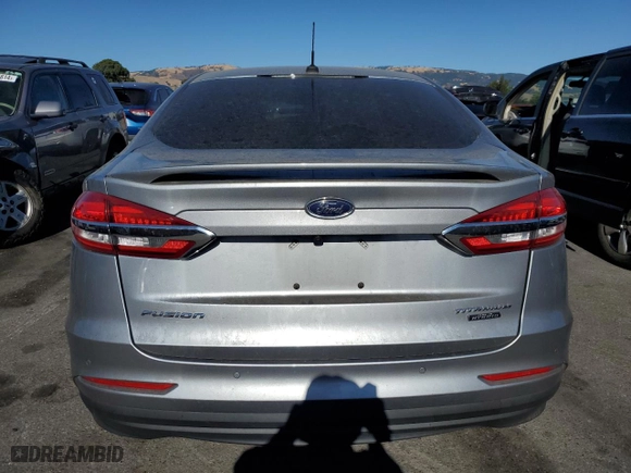 2020 Ford Fusion Plug-In Hybrid Titanium with VIN 3FA6P0SUXLR258459, listed as a Copart auction lot 71624294 with 116,228 mi miles and Salvage Title. Bid and sale history available at carsss.com. Image 6.