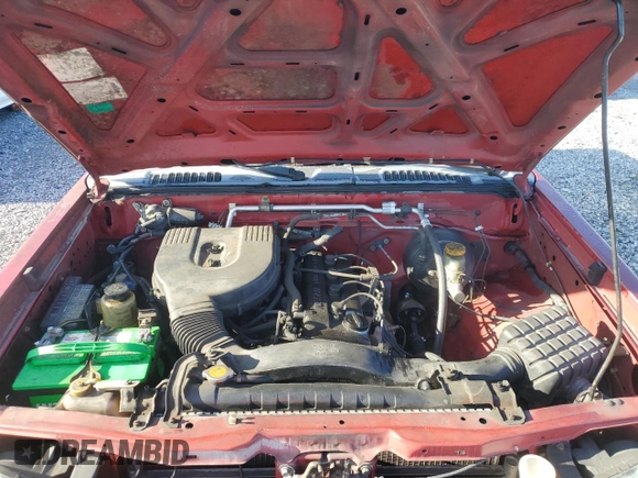 2002 Nissan Frontier XE with VIN 1N6DD26S72C312325, listed as a Copart auction lot 66313655 with 168,667 mi miles and Clean title. Bid and sale history available at DreamBid. Image 11.