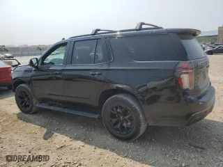 2022 Chevrolet Tahoe Z71 with VIN 1GNSKPKD8NR140433, listed as a Copart auction lot 64792034 with 51,675 mi miles and Salvage Title. Bid and sale history available at carsss.com. Image 2.