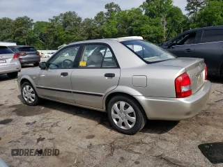 2003 Mazda Protege DX with VIN JM1BJ225X30107443, listed as a Copart auction lot 54777625 with 283,760 mi miles and Clean Title. Bid and sale history available at DreamBid. Image 2.