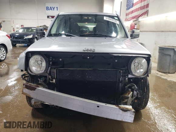 2014 Jeep Patriot Latitude with VIN 1C4NJPFB1ED767103, listed as a Copart auction lot 51844535 with 158,480 mi miles and Salvage title. Bid and sale history available at DreamBid. Image 5.