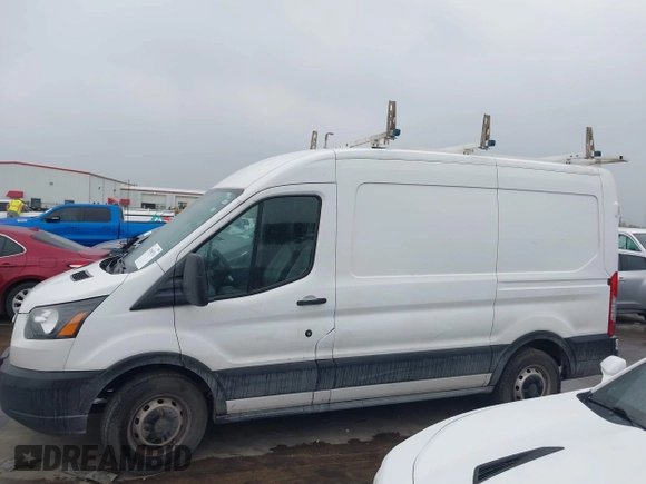 2019 Ford Transit with VIN 1FTYE1CM0KKB38525, listed as a IAAI auction lot 41940711 with 224,576 mi miles and . Bid and sale history available at DreamBid. Image 14.