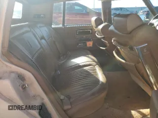 1988 Cadillac Brougham z VIN 1G6DW51Y9J9710161, wystawiony jako Copart lot #87093424 z przebiegiem 59 519 mil mil oraz Tytuł czysty. Historia ofert i sprzedaży dostępna na DreamBid. Obrazek 10.